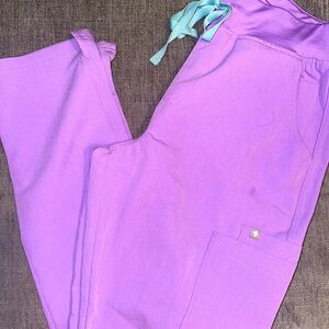 Figs pants . Purple with blue draw string